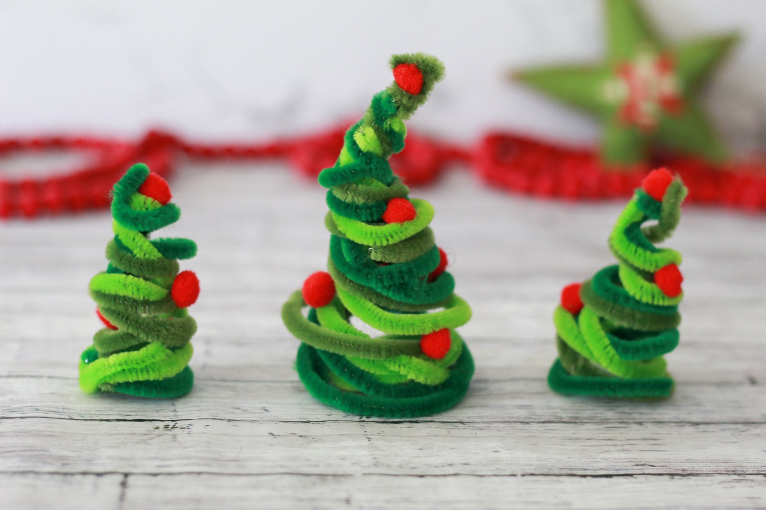 Pipe cleaner Christmas trees from Two Kids and a Coupon.