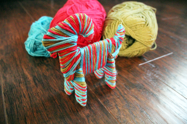 Yarn-wrapped Yule goat from One Mama's Daily Drama.