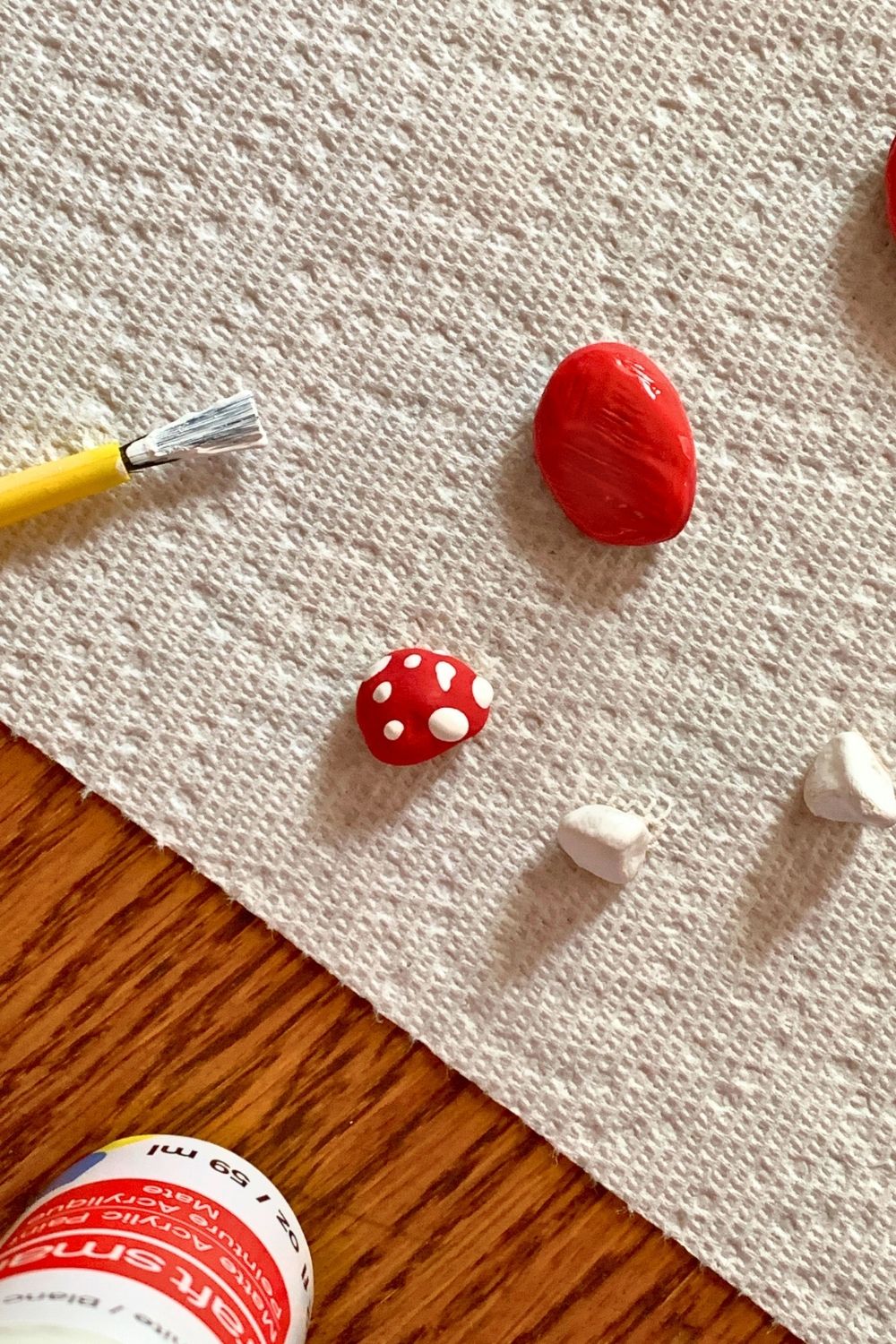 White dots on red painted rocks.